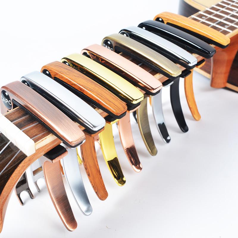 Zirconium Alloy Wood Grain Metal Capo: Multifunctional Transposition Clip for Guitar and Ukulele.