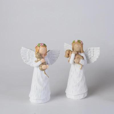 Tarptautiniai angelo dervos papuošalai: Pet Angel laikantis šunį ar katę