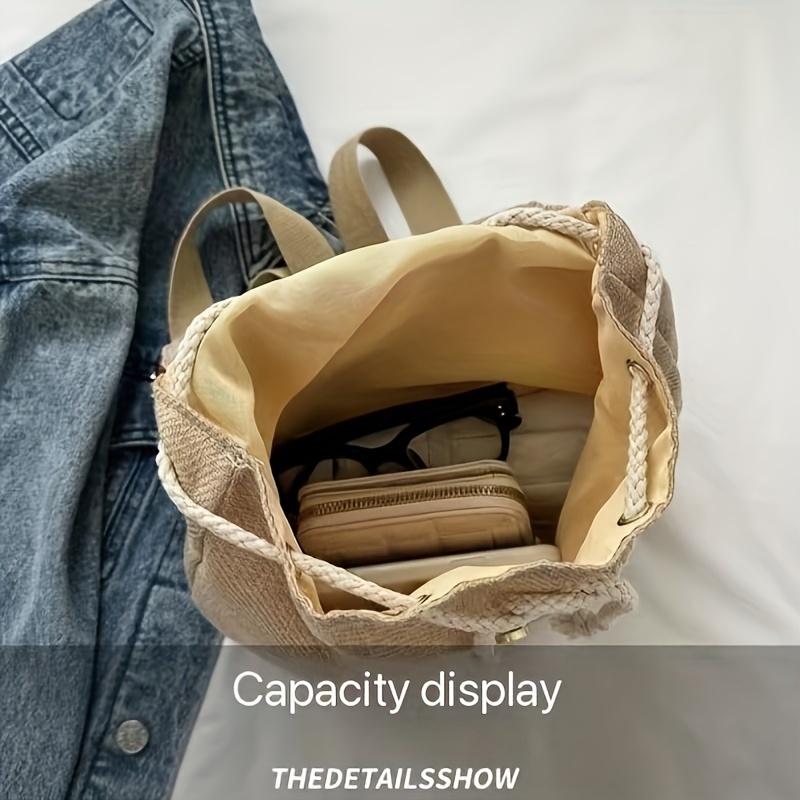 Schicker leichter Canvas-Rucksack mit Quasten-Detail Modischer Kordelzugverschluss Polyestergefüttert Damen Reise-Tagesrucksack