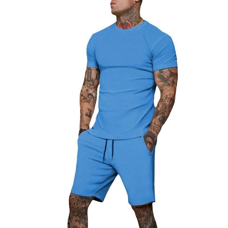 Conjunto de Camiseta de Manga Corta y Pantalones Cortos de Color Sólido para Hombre de Verano - Transpirable y Elegante.