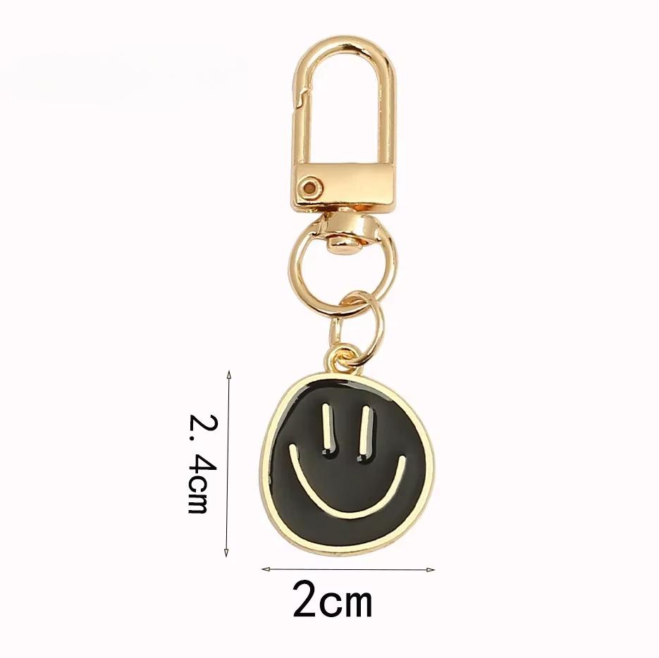Lovely Smile Face Keychain Cute White Purple Yellow Pink Blue Black Enamel Metal Key Ring Bag Pendant Accessories Women Girl CLE