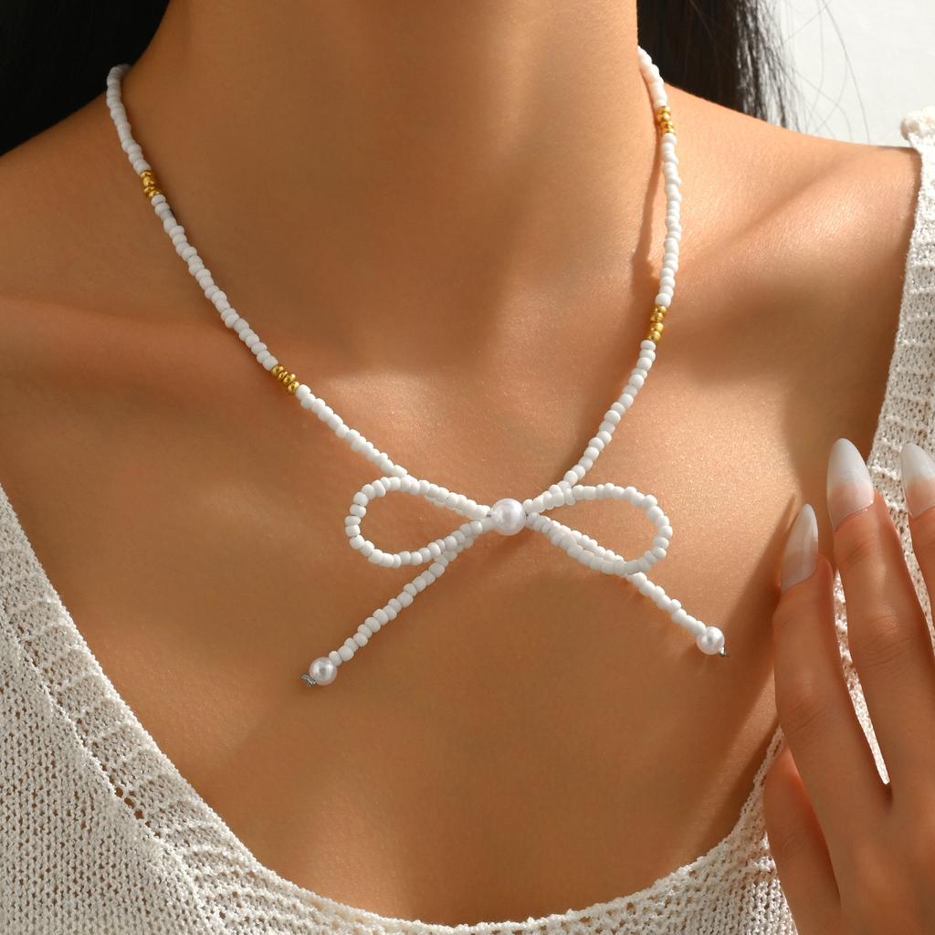Gentle and sweet Y1K rice bead bow necklace, simple and versatile woven collarbone choker neck chain female spot