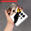 2DFlat Samsung phone case Cat with Yellow Glove Holding Black Object Phone Case Applicable to Galaxy S22 S23 S24 S25ULTRA S26 A12 A13 A14 A15 A16