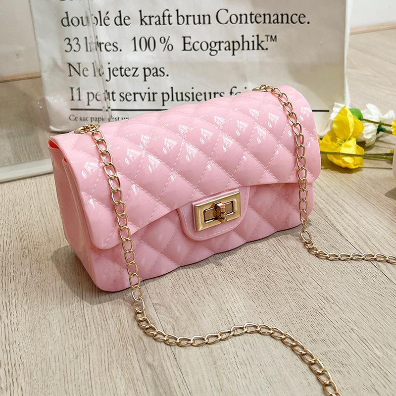 Fashion pearl shoulder jelly bag, women's versatile diamond lipstick change bag, one piece.