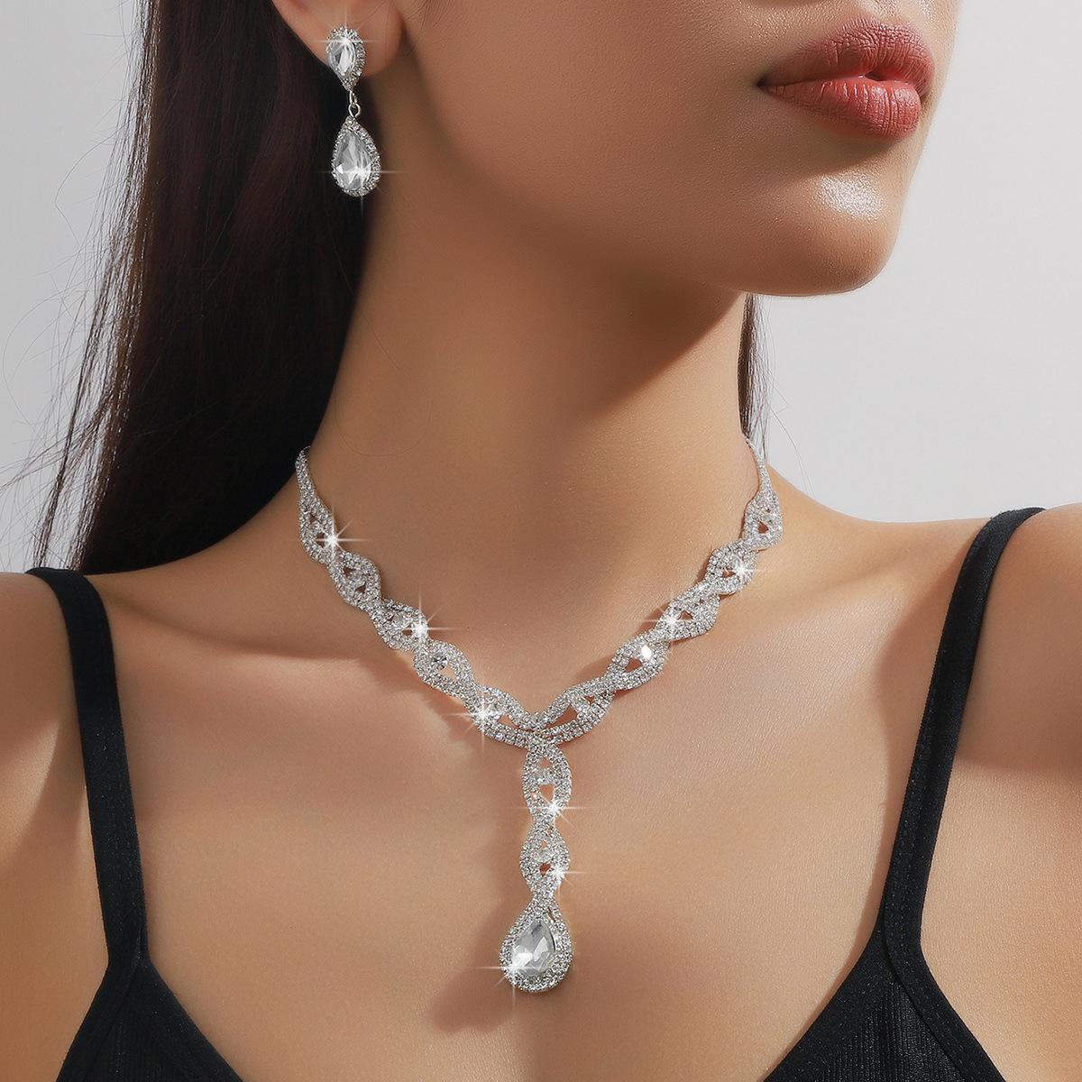 

Свадебный комплект украшений из трех частей ожерелье серьги-гвоздики браслет женская цепочка хит продаж свадебное платье аксессуары для женщин