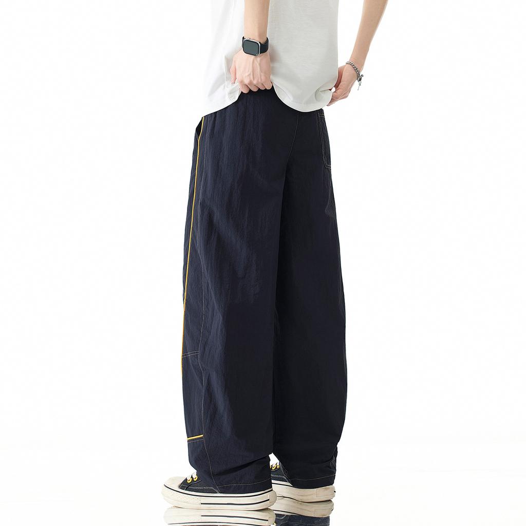 American trendy brand contrasting color splicing design scimitar casual pants men's summer new sports quick-drying tooling charging pants