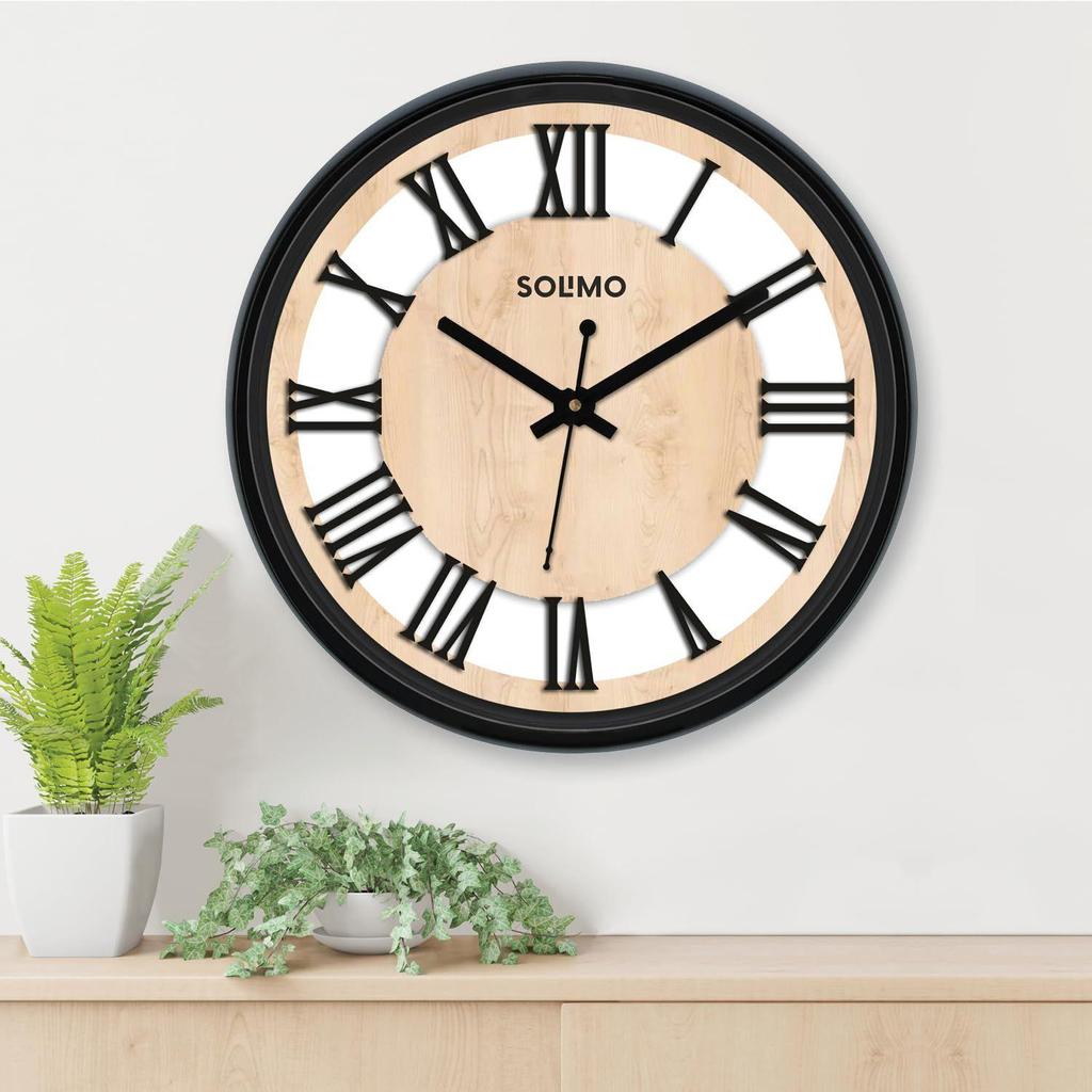 Roman Wheel 12-inch Plastic and Glass Silent Movement Wall Clock (Black).