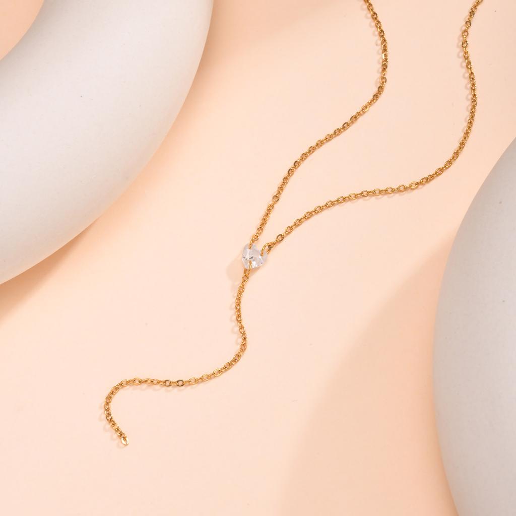 Lange Halskette für Damen mit Zirkon-Quaste in Herzform, Flache Edelstahl-Kreuzkette, Verstellbare Quasten-Mode-Pulloverkette