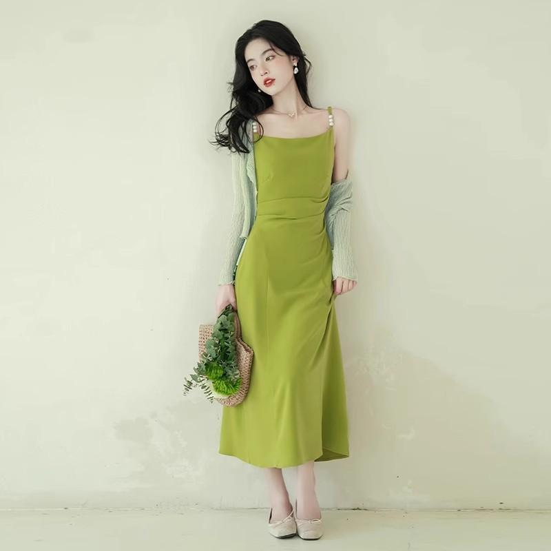 High sense temperament beautiful super fairy dopamine 2026 new summer vacation French suspender green dress tide