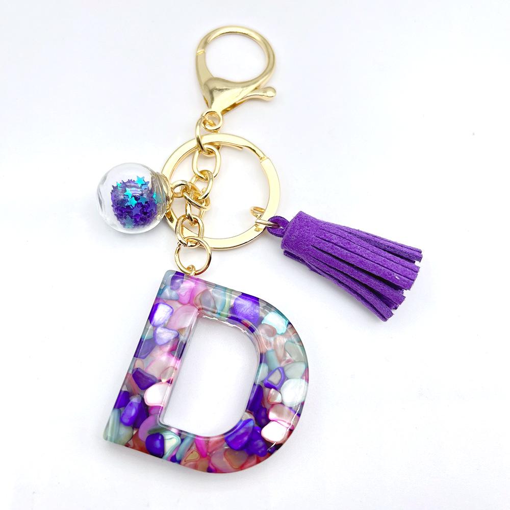 Breloc inițial englezesc de vânzare la cald european și american cu accesoriu cu ciucuri violet