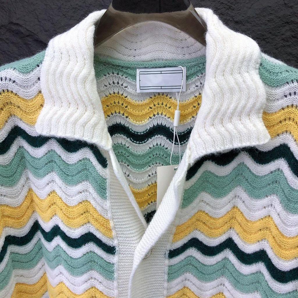 Women's Casual Knitted Wool Suit: Short-Sleeved Sweater & Shorts with Pearl Buttons and Color Matching.