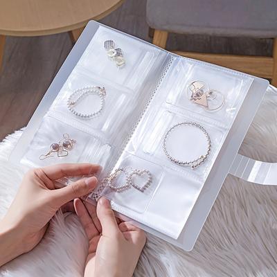 Album Organisateur de Bijoux Portable avec Poches Transparentes - Organisateur pour Boucles d'Oreilles, Bagues, Colliers - Sac Scellé à Fermeture Éclair Anti-Oxydation.