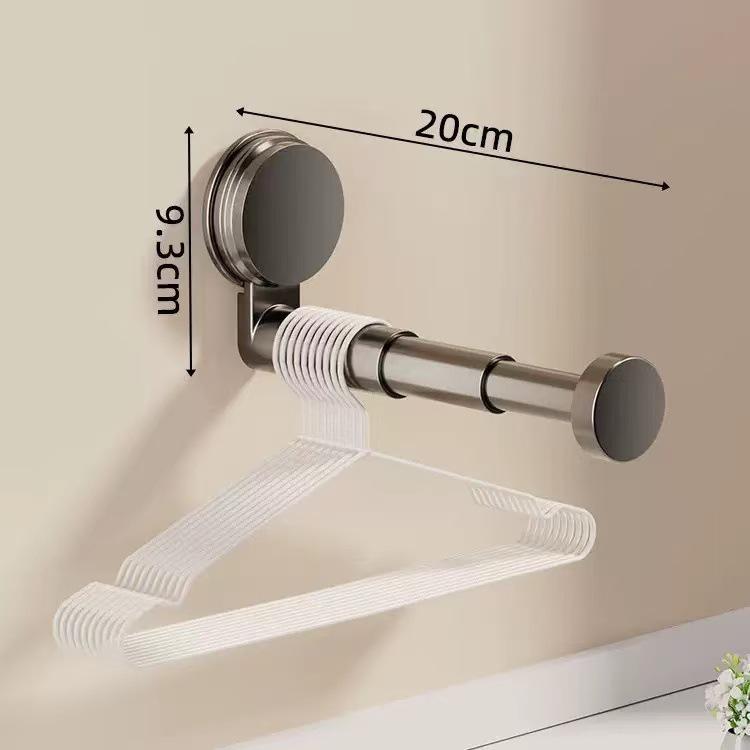 Telescopic No-Punch Suction Cup Wall Rack: Multi-functional Balcony Clothes Storage and Hanger Shelf with Traceless Hooks.