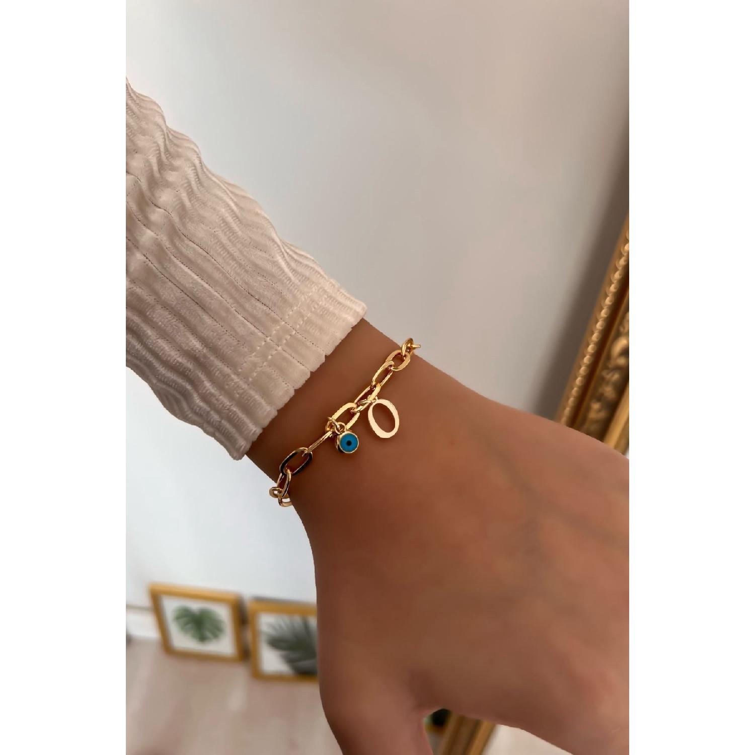 

Браслет-цепочка скрепки для бумаг с буквой О и болтающимся сглазом