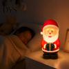 Festive Room Decor LED Lighted Christmas Santa Claus Figurine, Animated Smile Face Winter Home Accents Holding Gift Box Statue for Holiday Tabletop