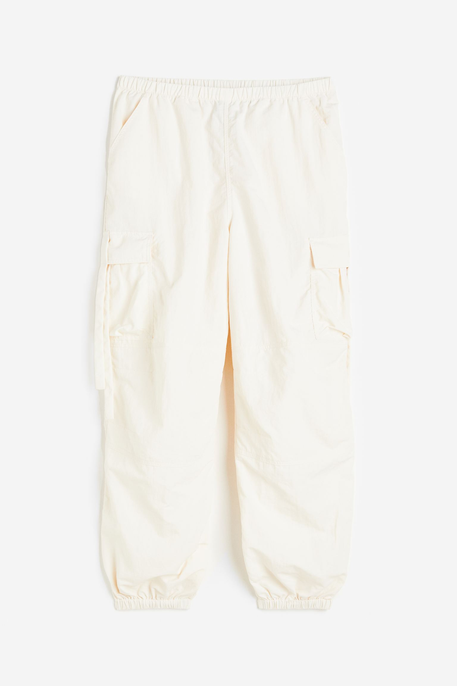 

Low-waisted parachute trousers
