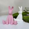 Söt sittande avslappnad kaninstaty prydnad, kanindekoration, påskkaninprydnad, modern konstdekoration