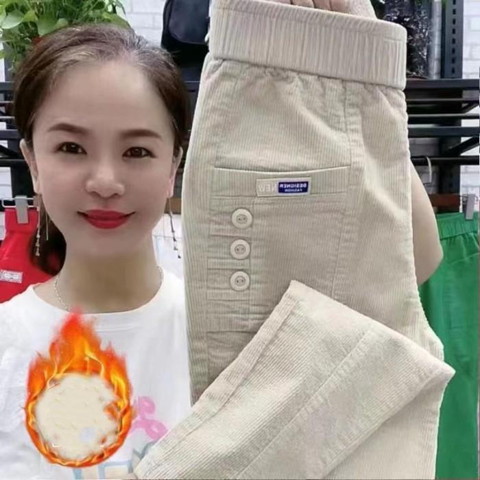 

Жіночі осінньо-зимові потовщені вельветові штани гаремного крою з високою посадкою, що облягають, зі звуженими штанинами L абрикосовий