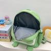 The new Japanese cute little frog backpack is the same for men and women, and the autumn versatile student large-capacity backpack bag.
