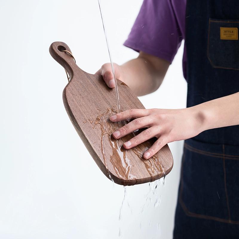 1pc Wood Small Cutting Board with Handle, Black Walnut Wooden Chopping Boards for Bread, Vegetables & Fruits, Dinner Cheese Board with Hole