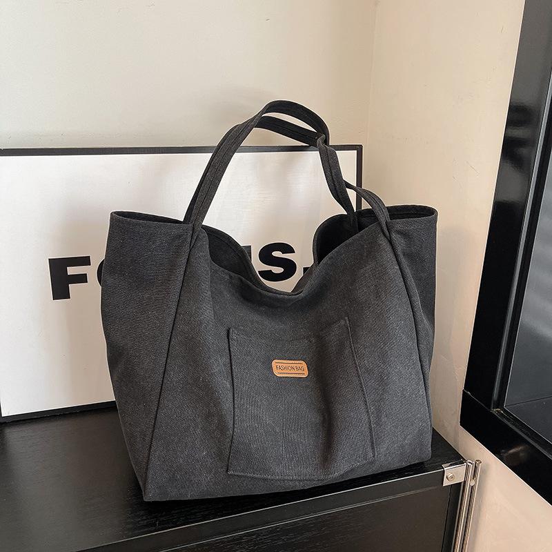 Casual large-capacity canvas bag women's bag 2025 new solid color simple tote bag fashionable shoulder armpit bag