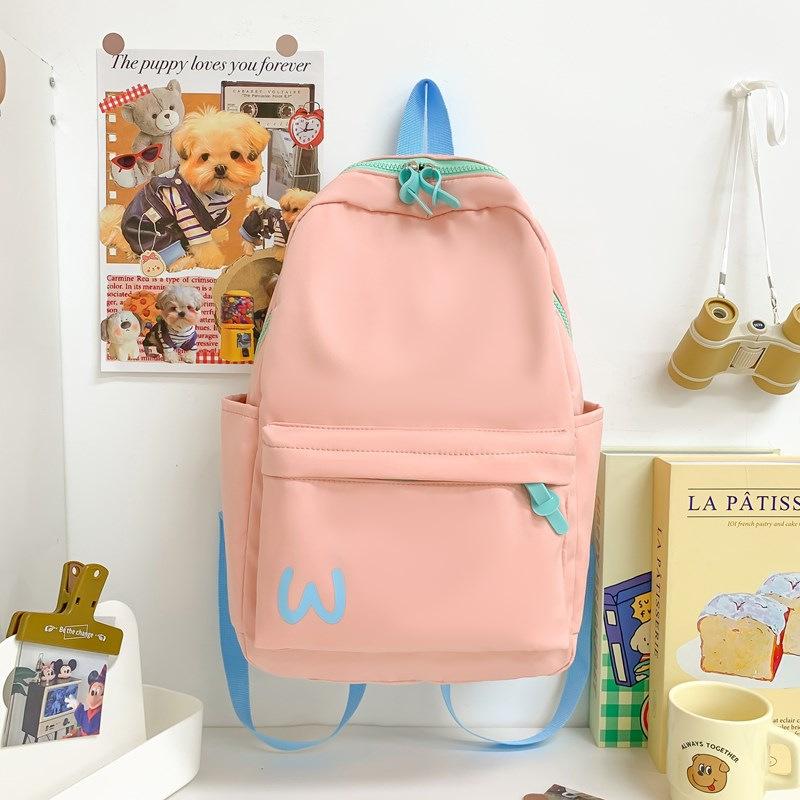 

Korean version large capacity simple backpack junior high school and high school student women s schoolbag high-end sense men розовый
