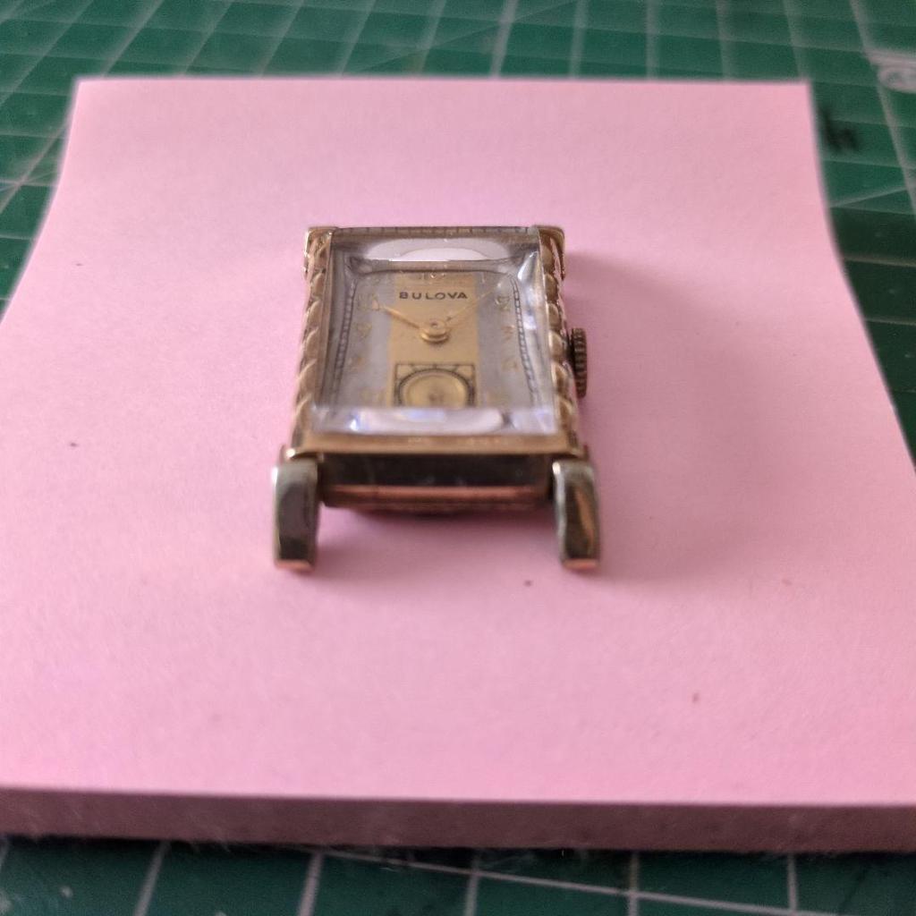 Used Bulova manual winding watch gold rectangle
