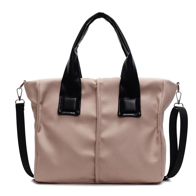 New simple commuter style haute couture anti-splashing nylon material single shoulder oblique span portable multi-functional women's bag