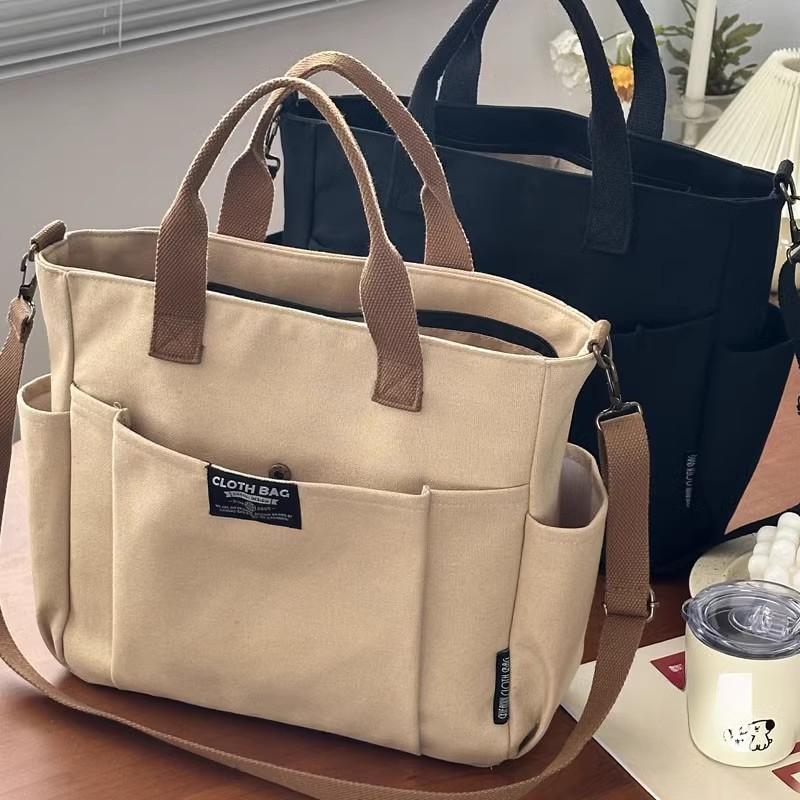 Borsa tote portatile per studentesse urbane minimaliste, grande capacità, pendolarismo, tela orizzontale, spalla singola, croce diagonale