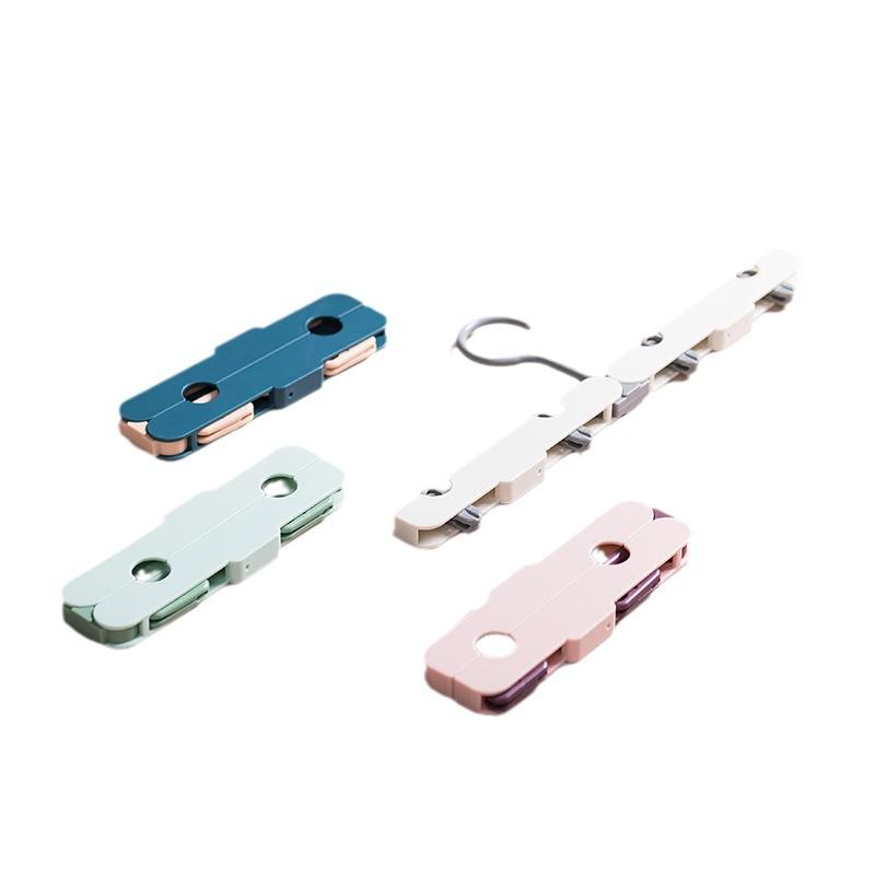 Přenosný věšák s více klipy a protiskluzovými kolíčky pro cestování, venkovní dobrodružství a sušení magických ponožek