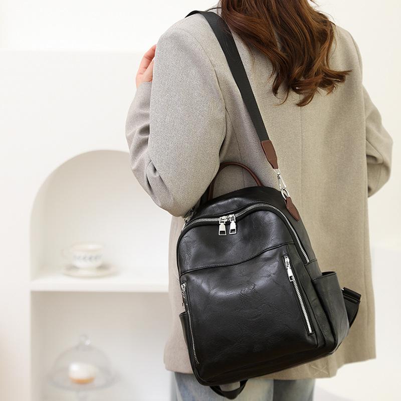 Soft Leather Versatile Backpack Women's Large-capacity New Simple Student Schoolbag Casual Retro Hand Shoulder Bag