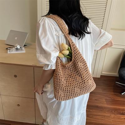 Hohle gewebte Tasche neue Sommer einfache Umhängetasche Tragetasche Mode Strandtasche vielseitige Damen-Tasche