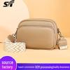A Chic, Retro One-shoulder Crossbody Bag Featuring a Lychee Pattern In a Simple, Versatile Design with a Solid Color Finish.