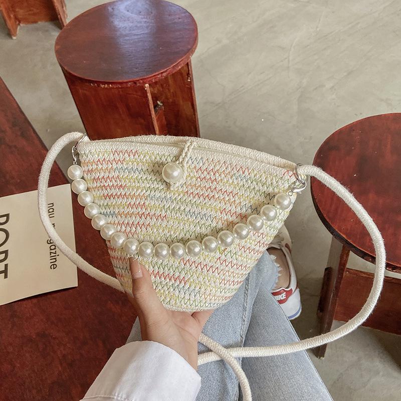 

Женская плетеная сумка-ведро из соломы в корейском стиле 2025 - Модная и уникальная сумка через плечо разноцветный
