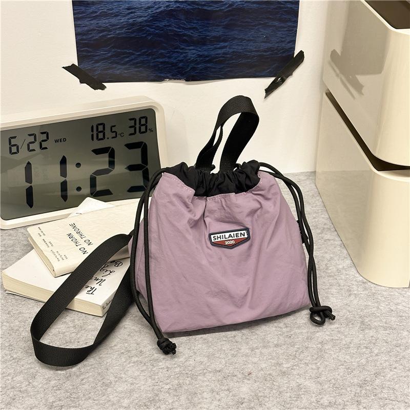 Japanese casual oblique span bag 2025 new Korean version fashionable versatile commuter sports small bag tooling shoulder bucket bag