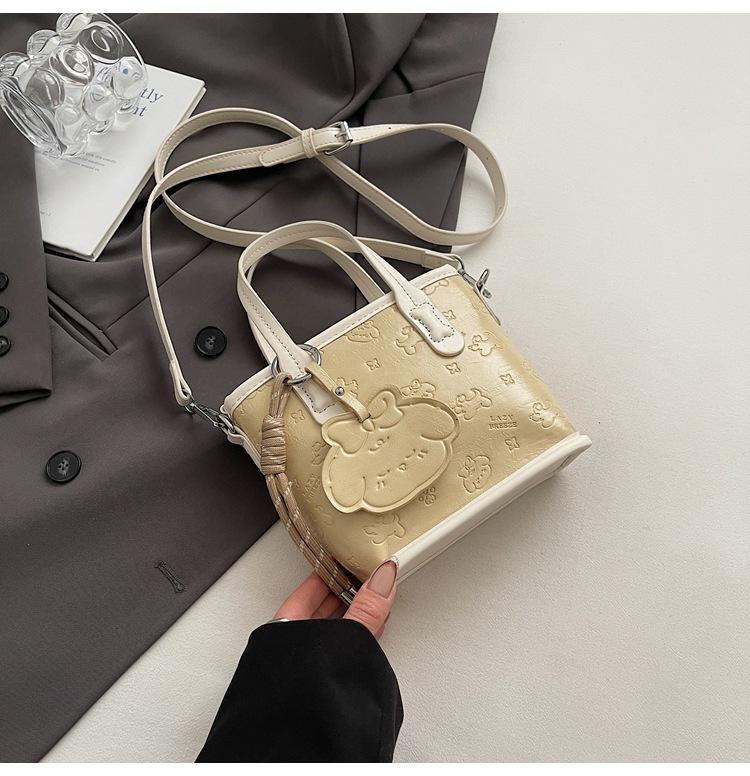 

2025 popular Korean simple high-end embossed portable bucket bag versatile commuter large-capacity shoulder messenger bag