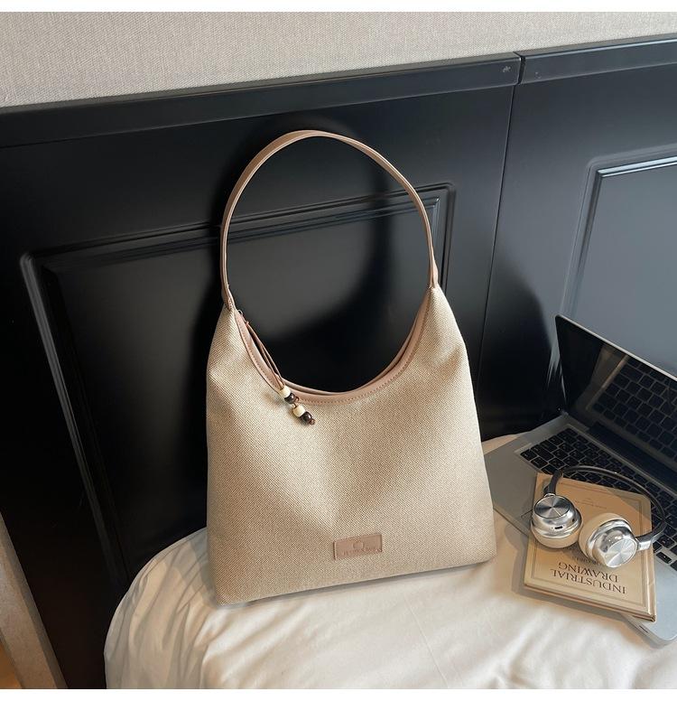 

Korean niche design women s bag versatile new large-capacity canvas tote bag one-shoulder armpit bag trendy хаки