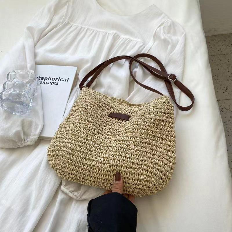 Multifunctional Women's Straw Crossbody Bag for Vacation and Beach.