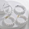 Simple and fashionable large circle pearl earrings temperament celebrity exaggerated personality earrings niche design sense light luxury earrings