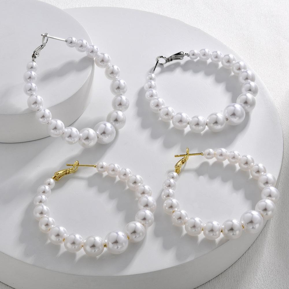 Simple and fashionable large circle pearl earrings temperament celebrity exaggerated personality earrings niche design sense light luxury earrings