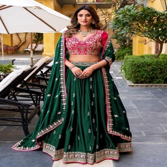 Emerald Green Silk Lehenga Choli with Contrast Pink Embroidered Blouse and Dupatta UNSTITCHED зелёный