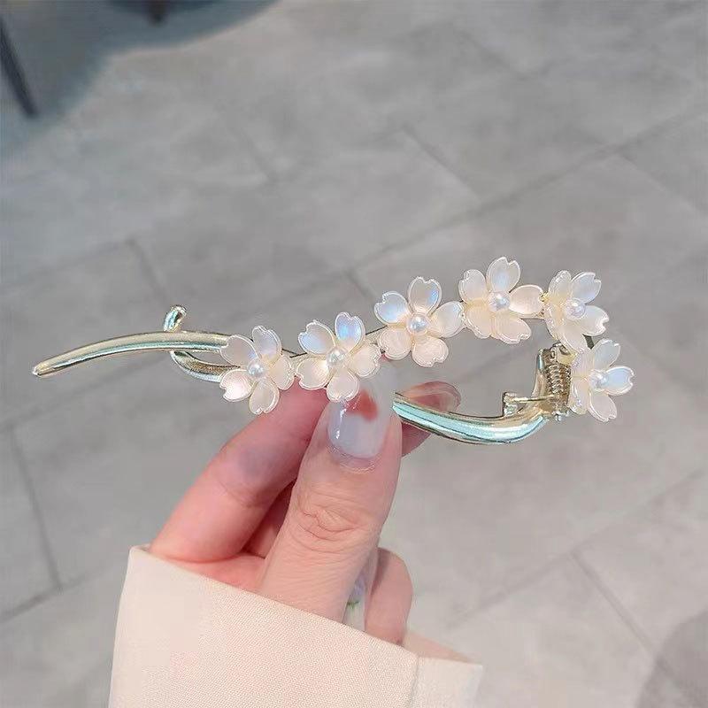Factory direct fashion flower pearl twist clip elegant hairpin Internet celebrity head spring clip
