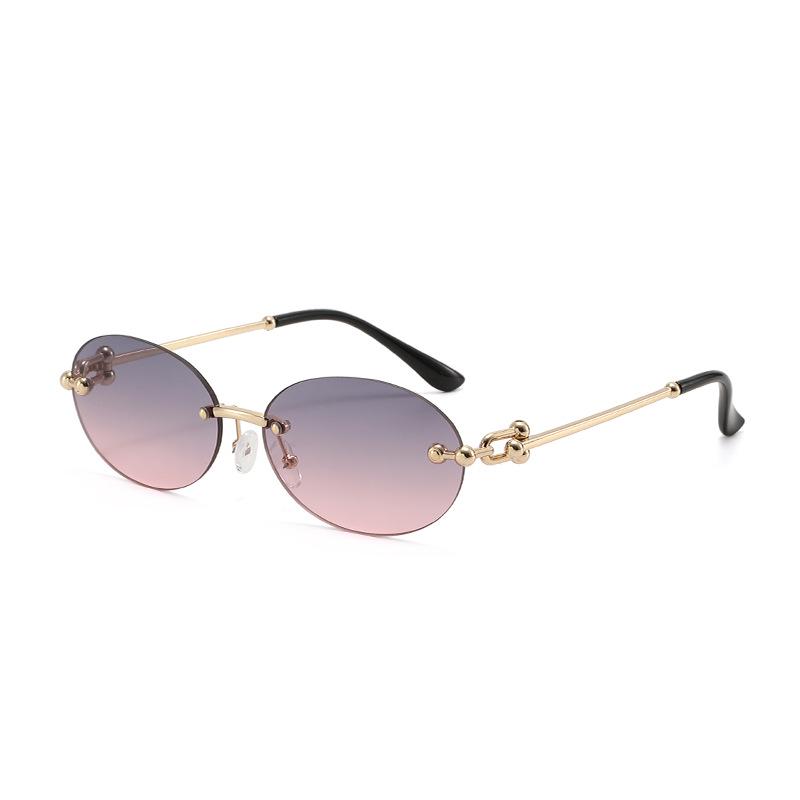 2025 Trendy Retro Rimless Metal Sunglasses: European & American Style UV Protection for Women