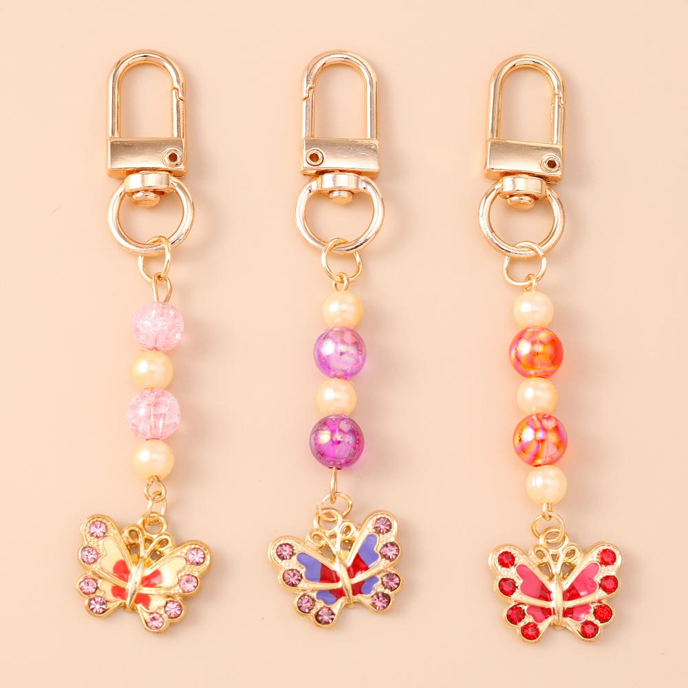 Cute Enamel Flower Butterfly Keychain Women Girls Beads Pearl Key Ring Pendants for Handbag Decor DIY Handmade Jewelry Gifts