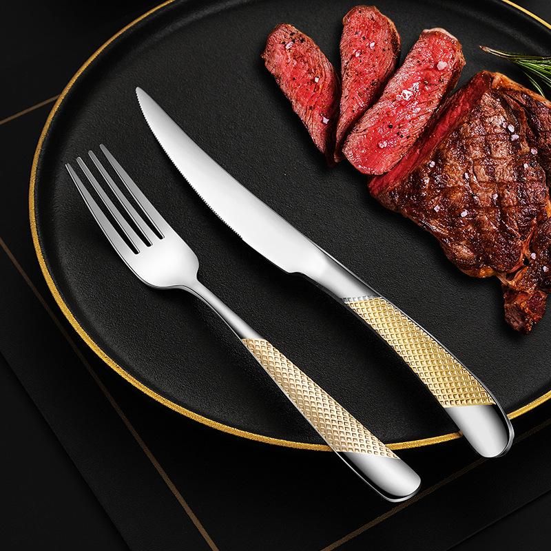 Star Diamond Stainless Steel Gold-Plated Flatware Set: Luxury Knife, Fork, and Spoon for Upscale Dining.