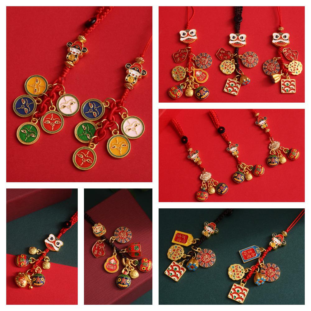 Goldener Glücksschlüsselanhänger: Reichtumsgott verschlingt Goldtier für Familie, perfekt als Auto- oder Handyanhänger.