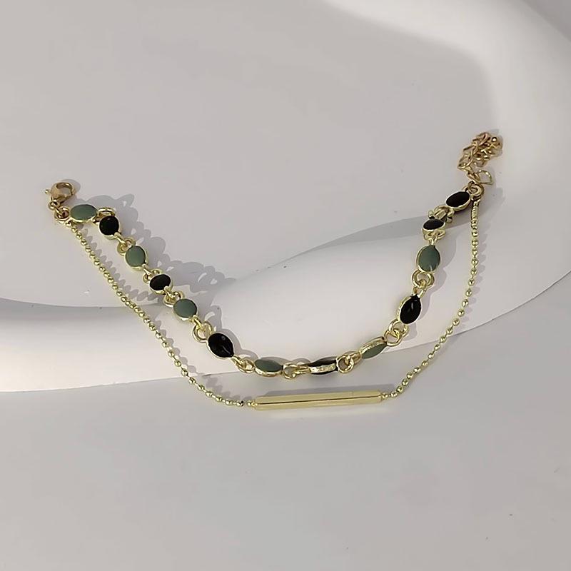 French Retro Double-Layer Bracelet: Stylish Light Luxury Bangle for Women.