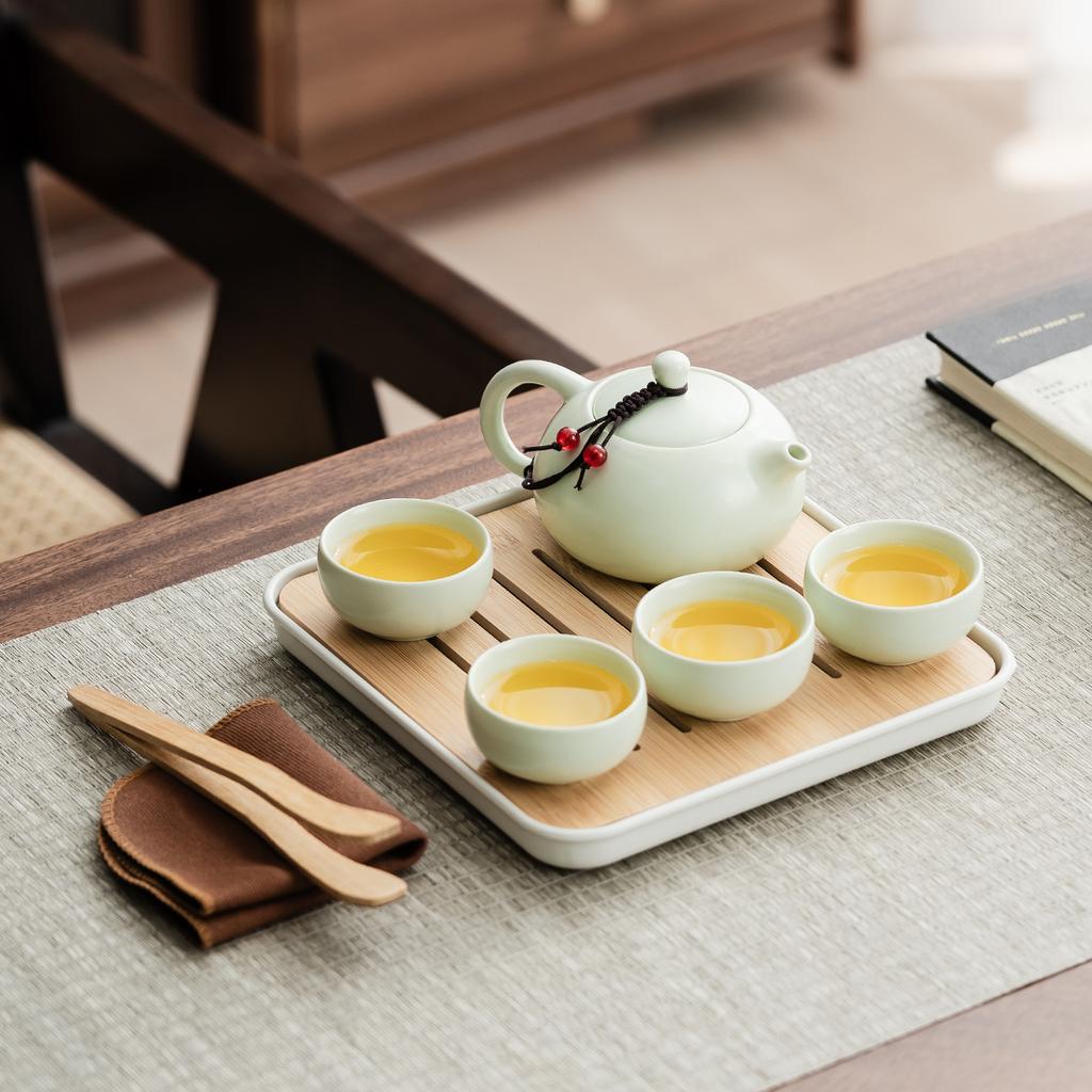Portable Bag, Travel Kung Fu Tea Set, Ceramic Xishi Pot, One Pot, Two Cups, Four Cups Set, Creative Gifts.
