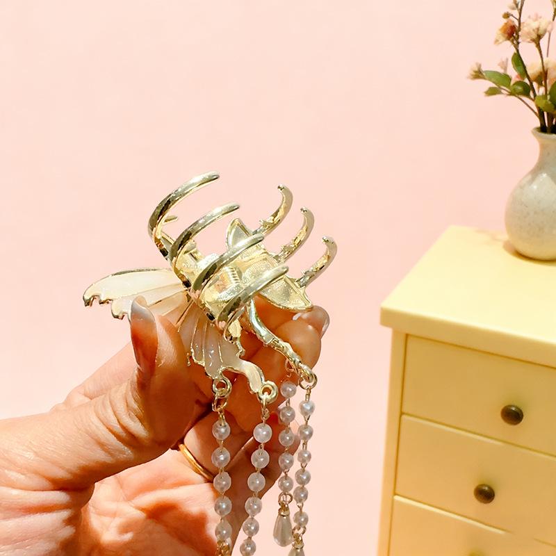 Elegant Medium Pearl Tassel Butterfly Hair Clip for Women - Versatile Half-Up, Ponytail, and Hair Claw Styling.