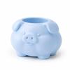 A Container In the Shape of a Plump Blue Pig
